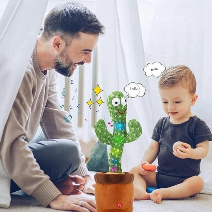 Happy toddler playing with an interactive speaking cactus toy next to father