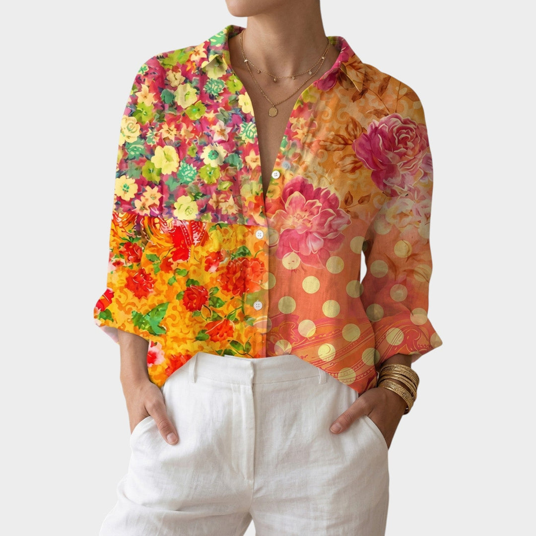Flat lay styling of the womens floral garden button up blouse with summer accessories