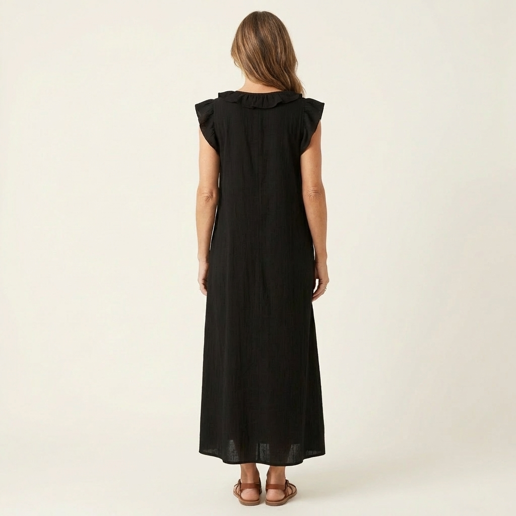 Back view of black maxi dress with flowy skirt design