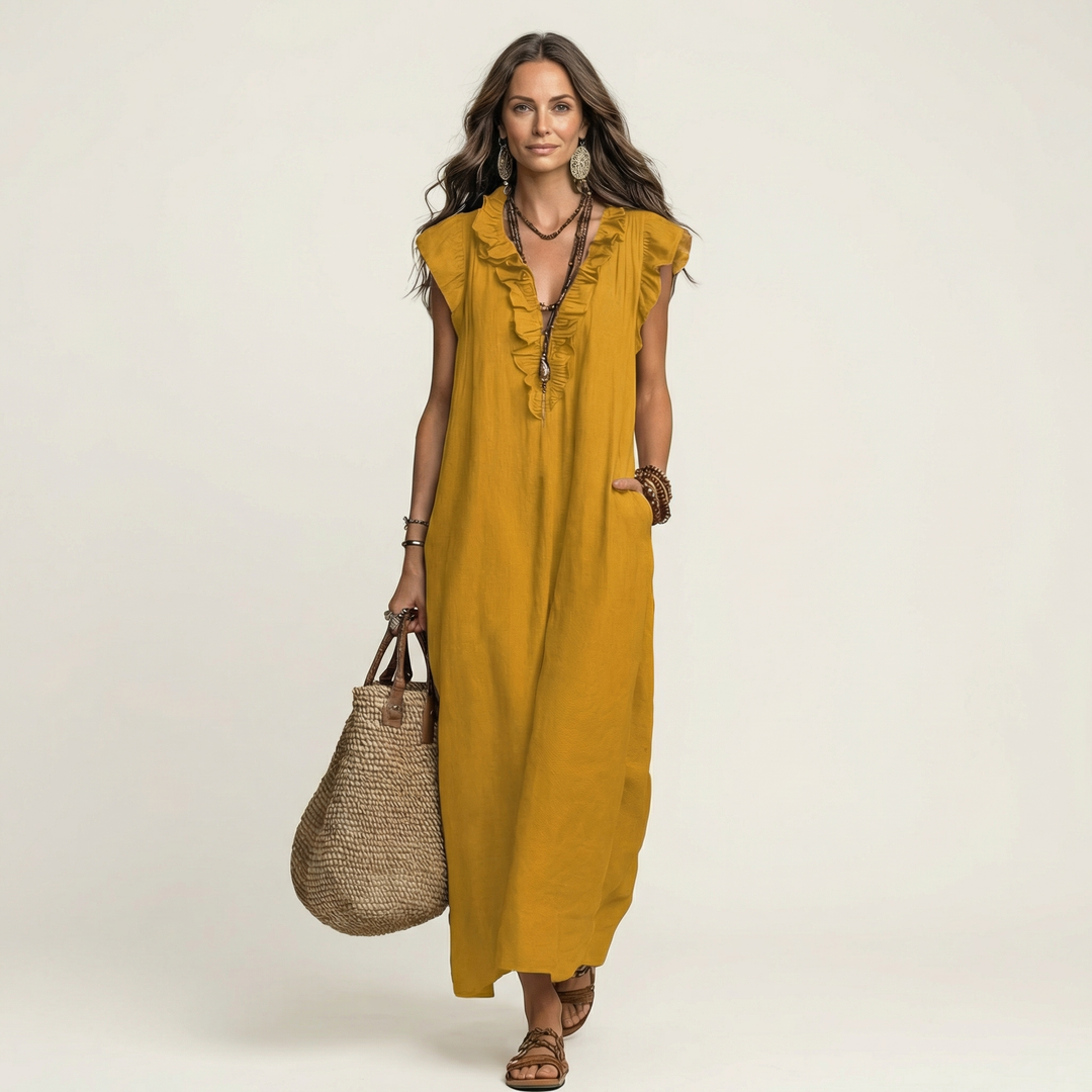 Elegant white maxi dress featuring convenient side pockets