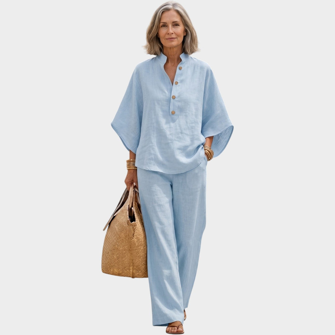Model wearing a light blue matching set with relaxed fit top and wide leg pants