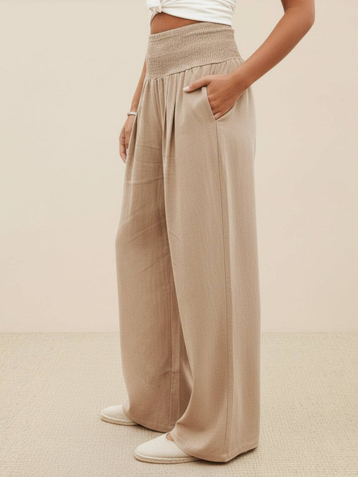 Casual summer trousers featuring comfortable smocked waistband and pockets