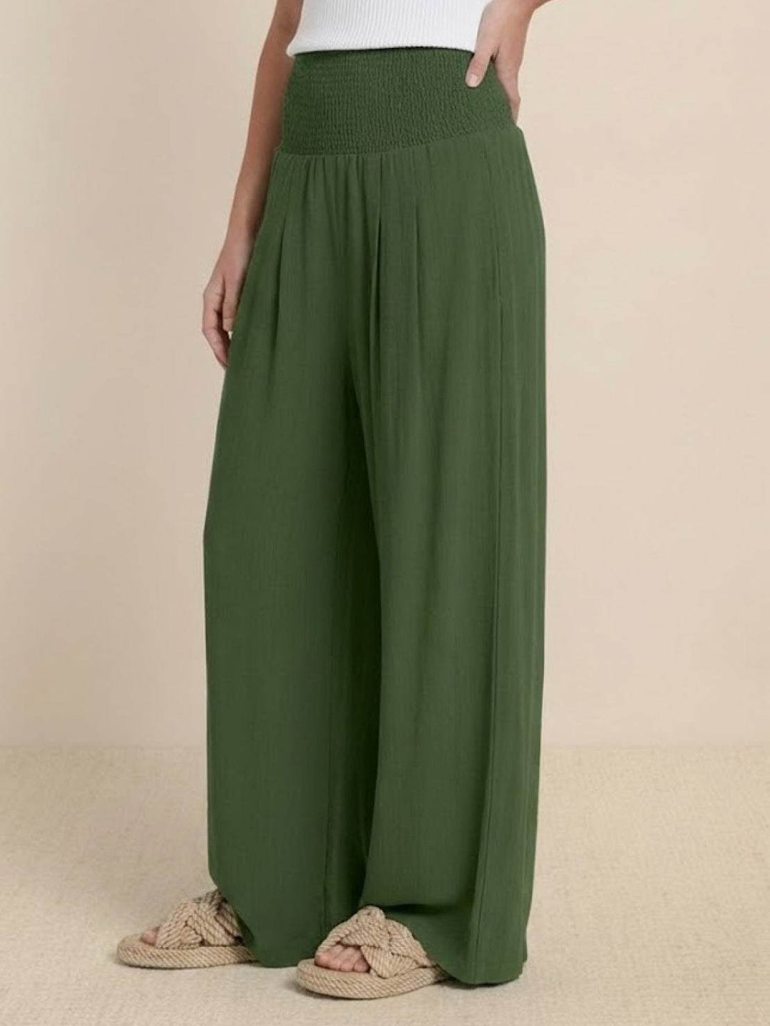 Detailed shot of functional side pockets on casual palazzo trousers