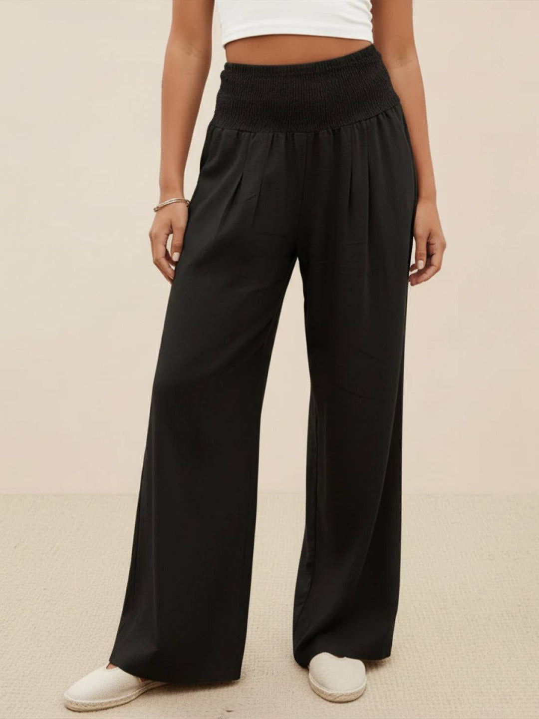 Women's high waist smocked wide leg palazzo trousers in black
