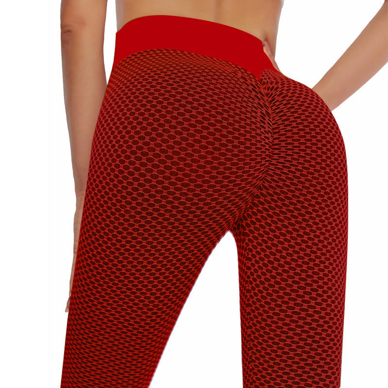 Rear view of women wearing red high-waist scrunch butt lifting yoga leggings