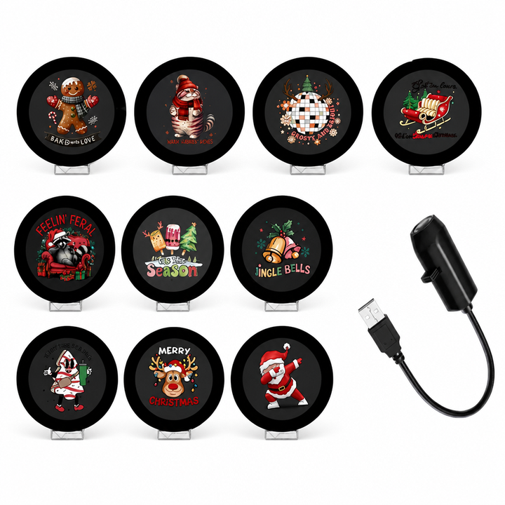 Holiday light projector showing 10 Christmas scene projection discs and USB cable