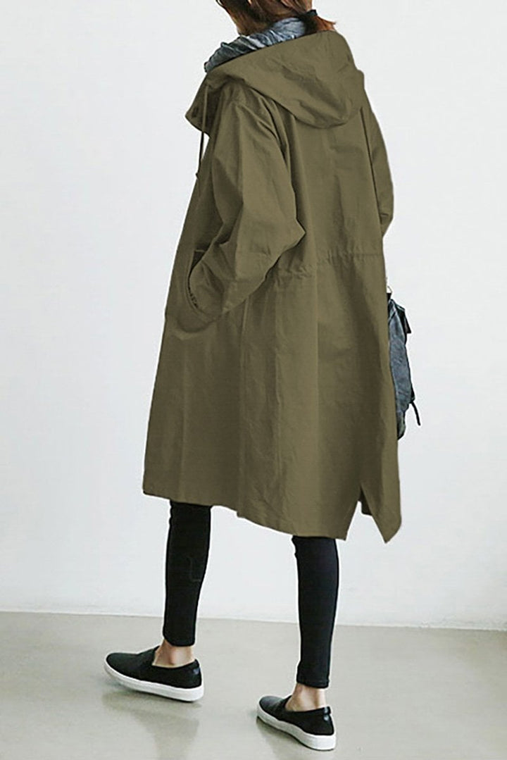 Back view of a model wearing an army green hooded rain trench coat