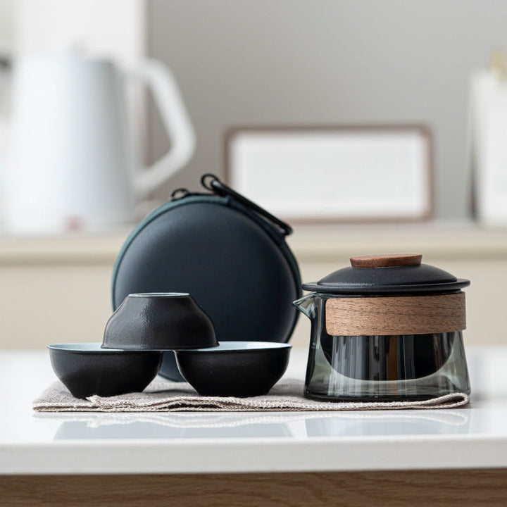 Compact portable teapot with built-in infuser for loose leaf tea brewing on the go