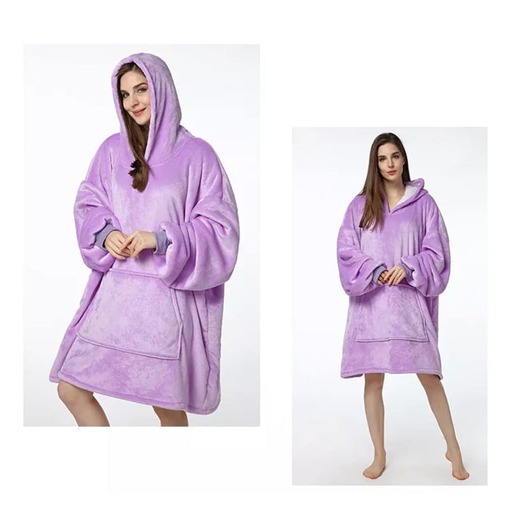 Model wearing the purple hooded blanket with sleeves and front pocket