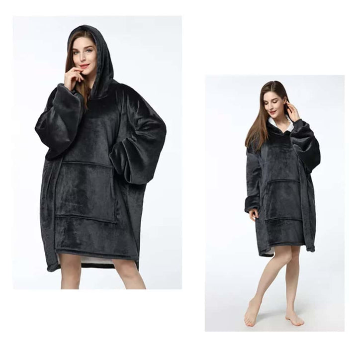 Model wearing the black oversized hooded blanket sweatshirt