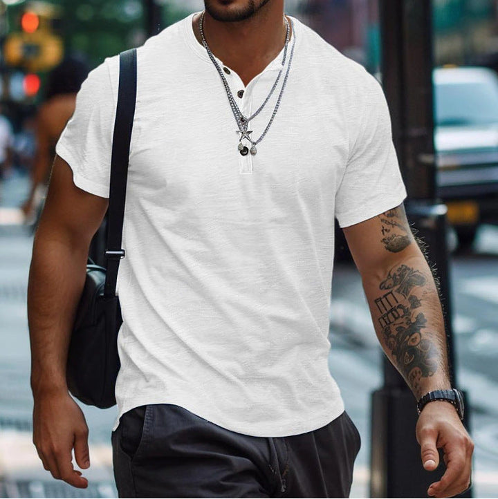 Detailed shot of collar and button details on men's cotton blend t-shirt