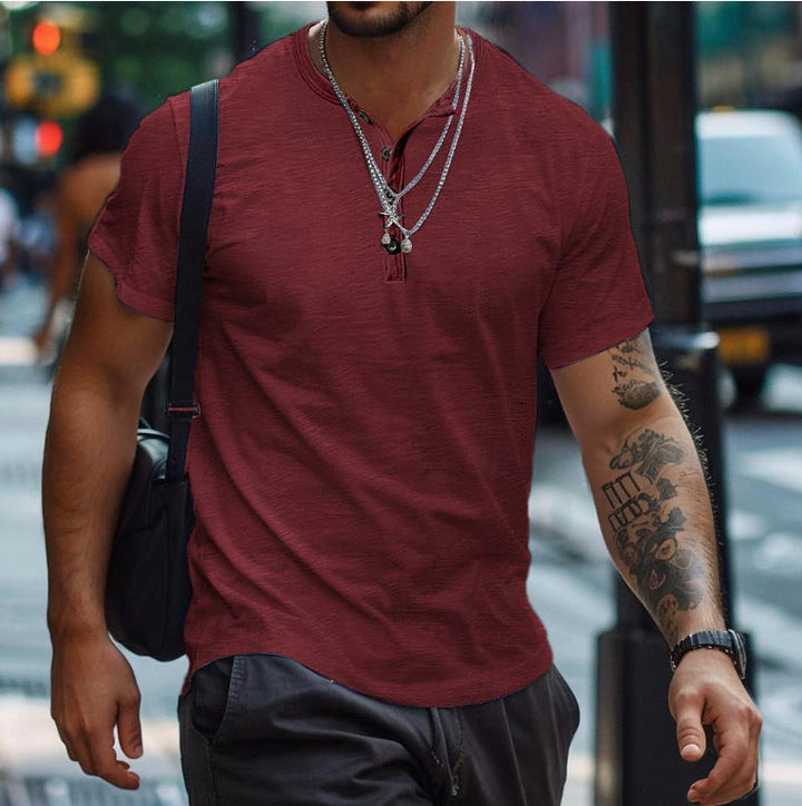 Men's short sleeve henley t-shirt folded neatly, showing quality fabric