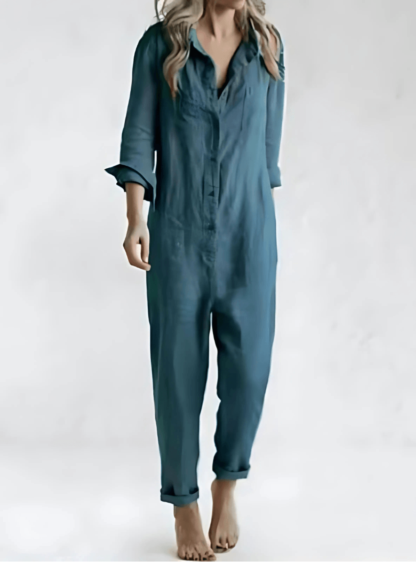 Close-up of the collar and button details on a womens one-piece utility jumpsuit