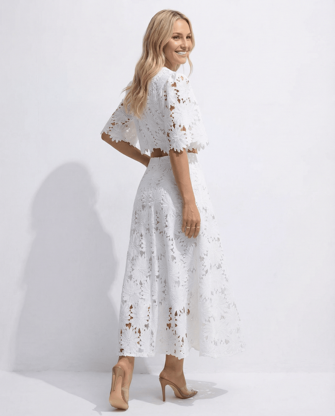 Side profile of elegant lace party dress for evening events