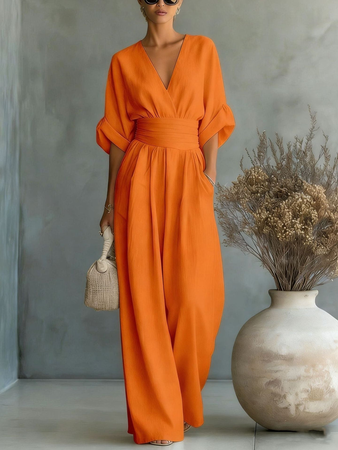 Full length shot of elegant balloon sleeve jumpsuit for evening wear