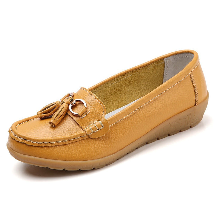 Lifestyle shot of women's slip-on walking shoes styled for daily errands