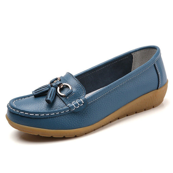 Insole branding and arch support view of women's casual slip-ons