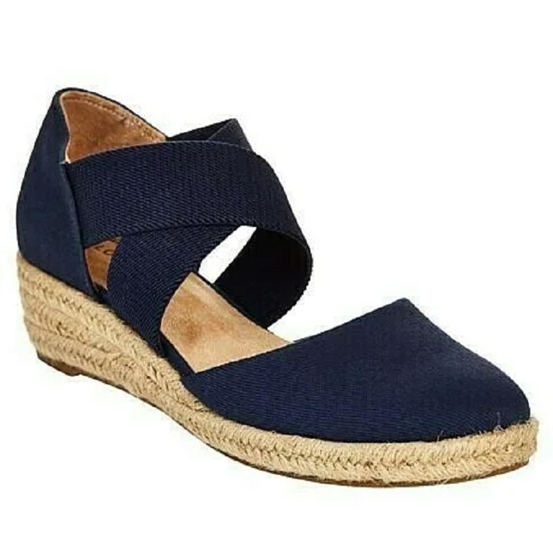 Navy blue women's espadrille wedge sandal with crisscross elastic straps