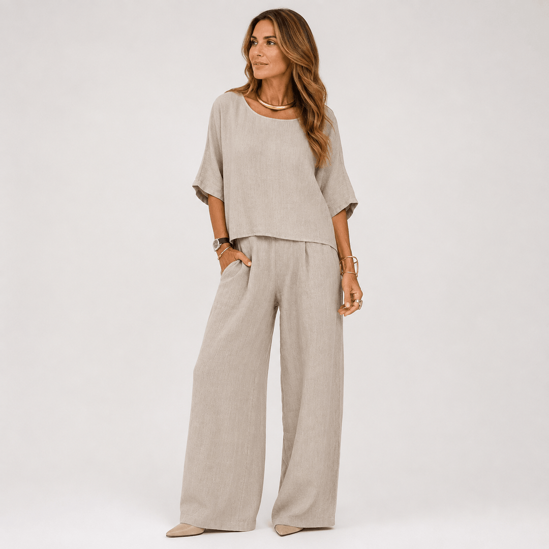 Woman wearing a neutral relaxed two-piece top and wide-leg pants set