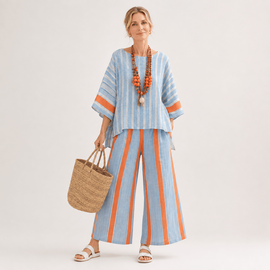 Model wearing a women's striped matching two-piece co-ord set with wide-leg pants