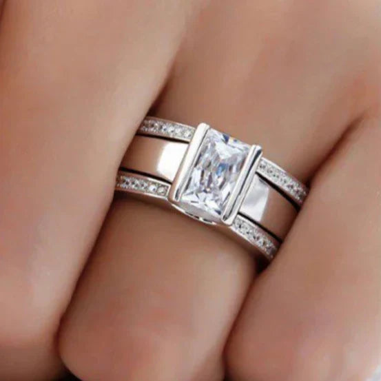 Close-up view of the vintage inspired silver ring on a finger