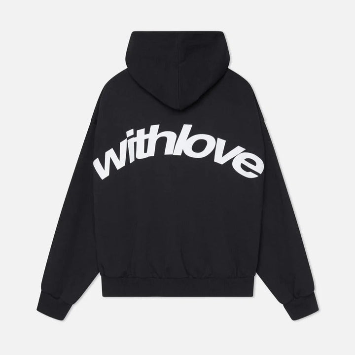 Black unisex oversized graphic hoodie viewed from the back showing bold white lettering