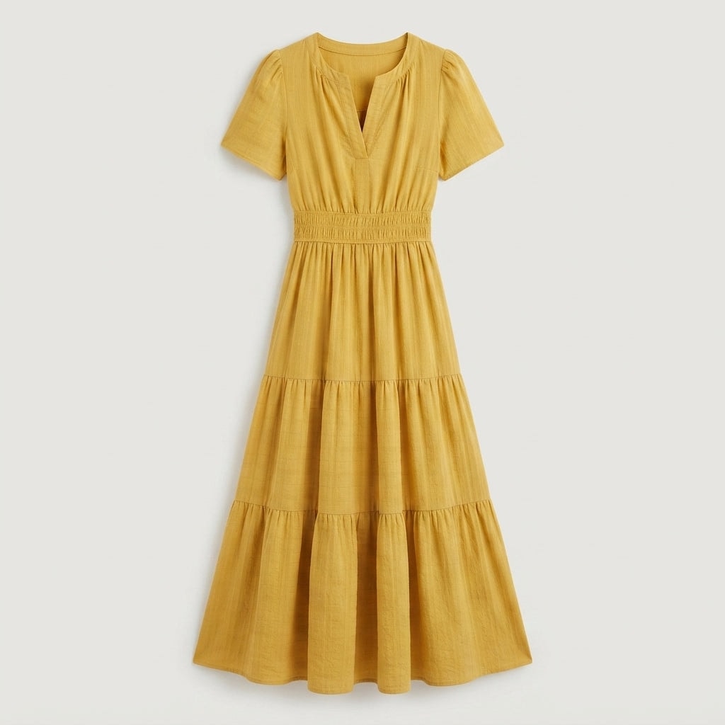 Flat lay view of the yellow tiered flutter-sleeve maxi dress