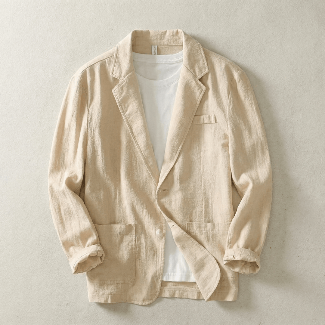 Beige men's tailored blazer jacket displayed on a textured background