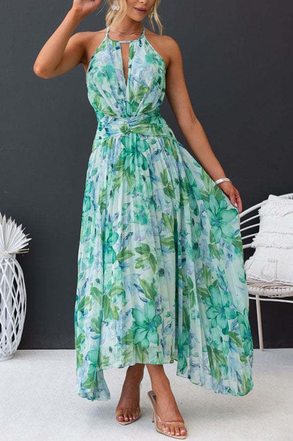 Front profile of green floral summer maxi dress with tiered skirt