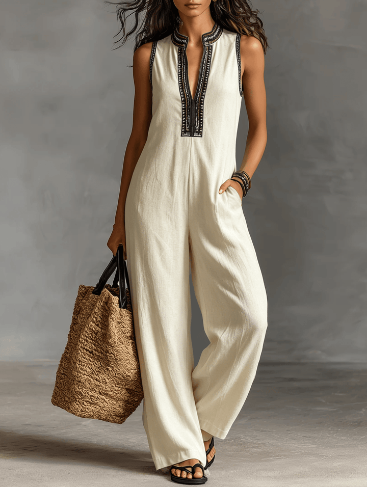 Close-up of embroidered stand collar and zipper detail on women's summer jumpsuit