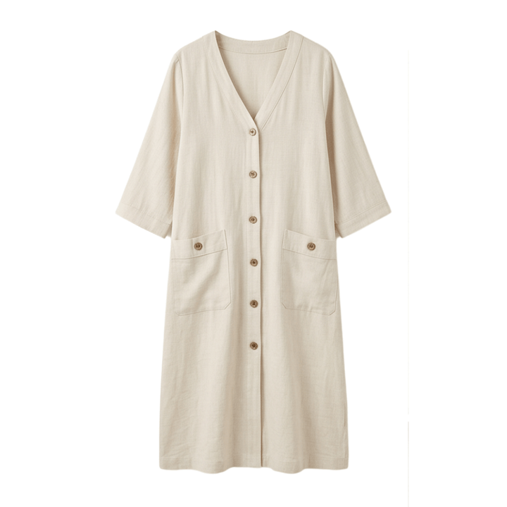 Studio shot of the cream colored button-front midi dress