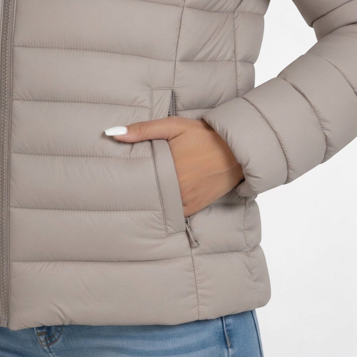 Close-up of the jacket pocket detail and quilted texture