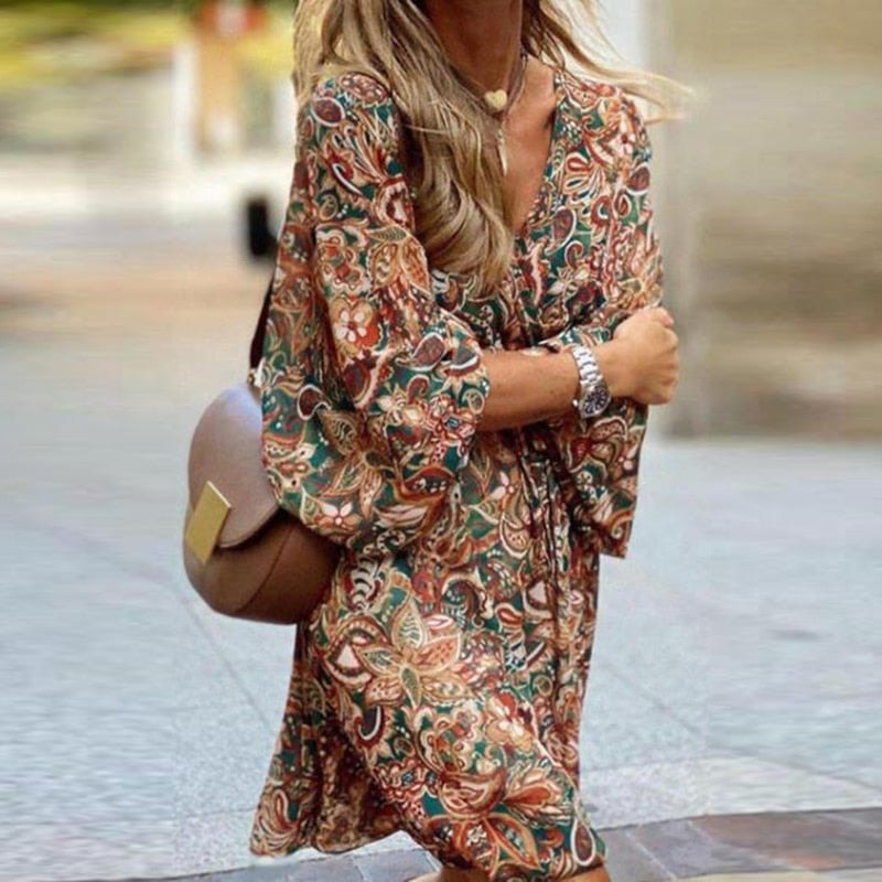 Brown boho paisley print mini dress with long sleeves and tie-front waist detail