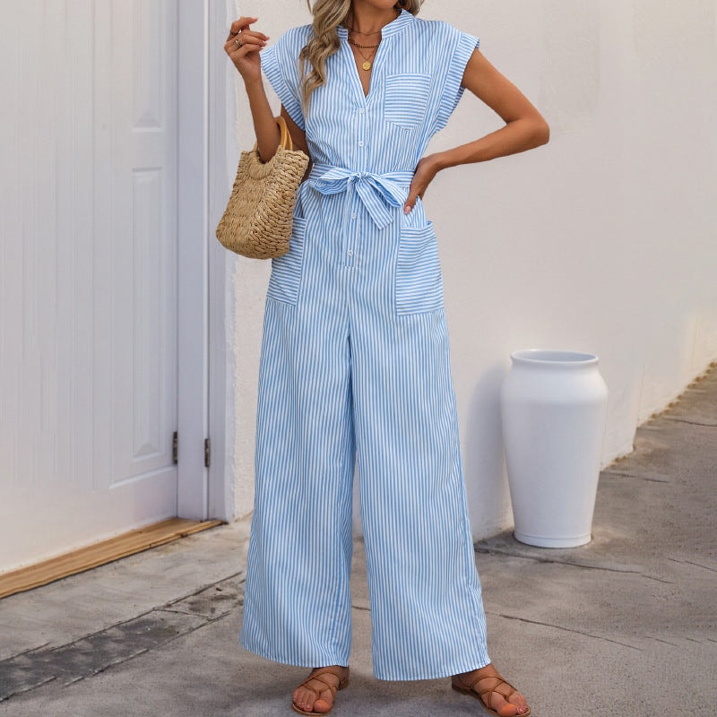 Back view of women's blue striped wide-leg jumpsuit showing casual summer style