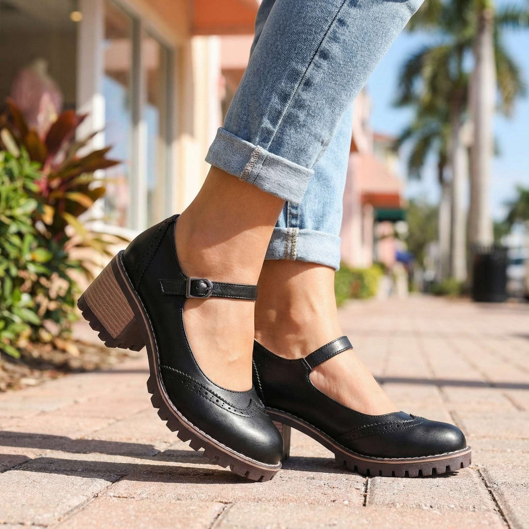 Womens comfort brogue Mary Jane shoes showing side profile with supportive block heel