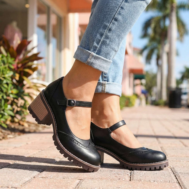 Womens comfort brogue Mary Jane shoes showing side profile with supportive block heel