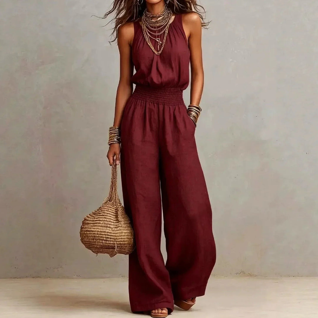 Smocked waist halter neck wide leg jumpsuit in summer fashion style