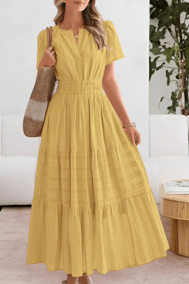 Women's tiered maxi dress with flutter sleeves in casual style