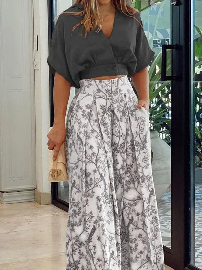 Womens floral wide-leg two-piece co-ord set featuring a matching summer outfit and casual trousers.