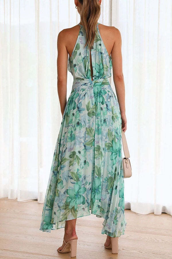 Back view of women's green floral halter maxi dress for summer vacation and parties