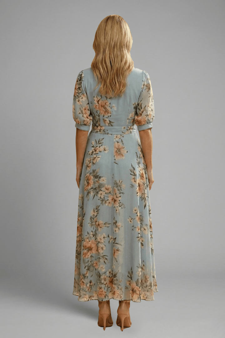 Close-up of floral print fabric and tie detail on women's summer maxi dress