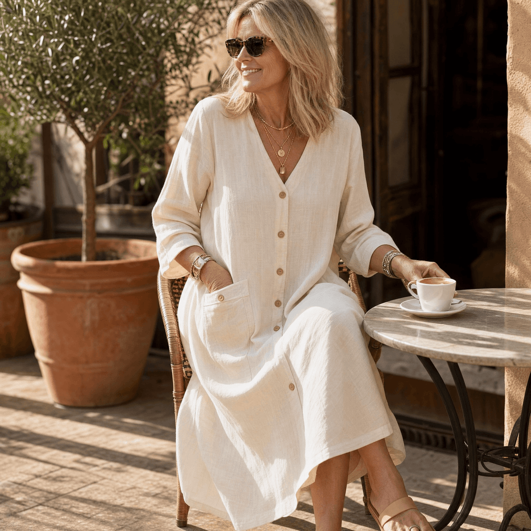 Casual summer midi dress in cream with tortoiseshell buttons and short sleeves