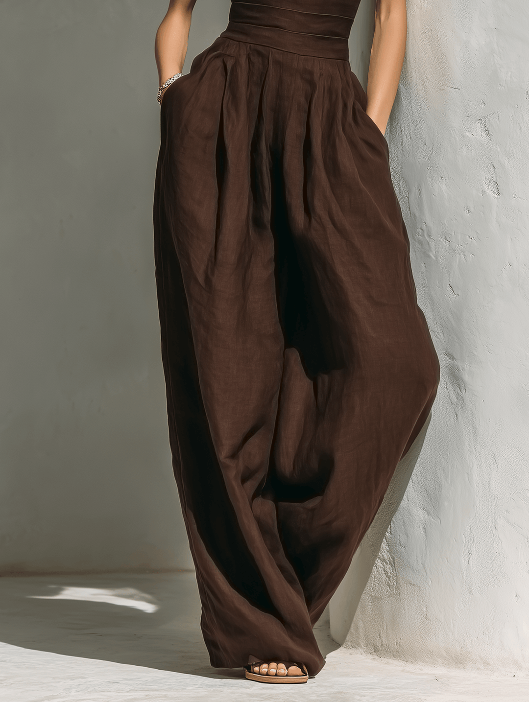 Close-up of v-neckline and fabric texture on casual summer women's jumpsuit