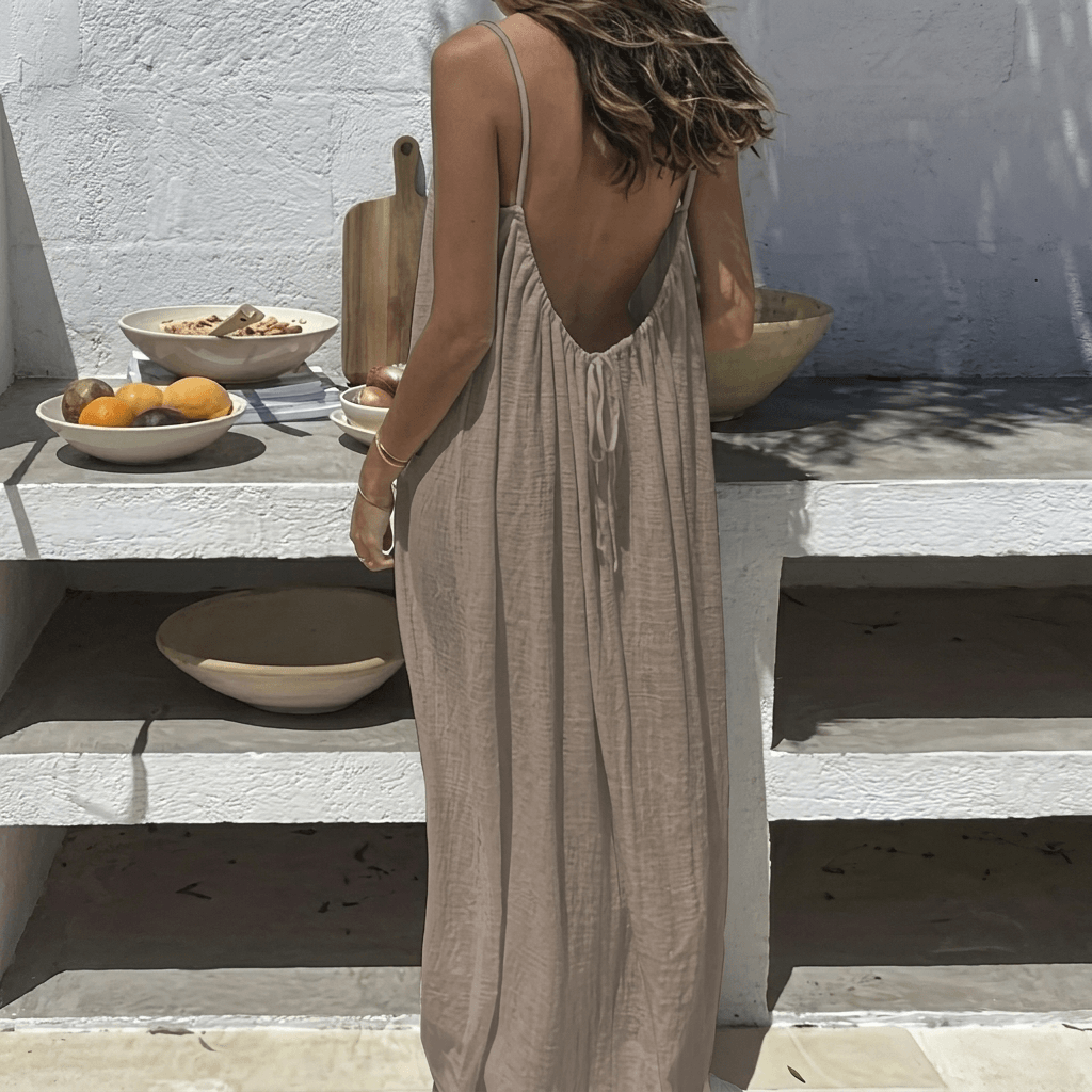 Close-up fabric detail of the lightweight material on a loose-fit maxi dress