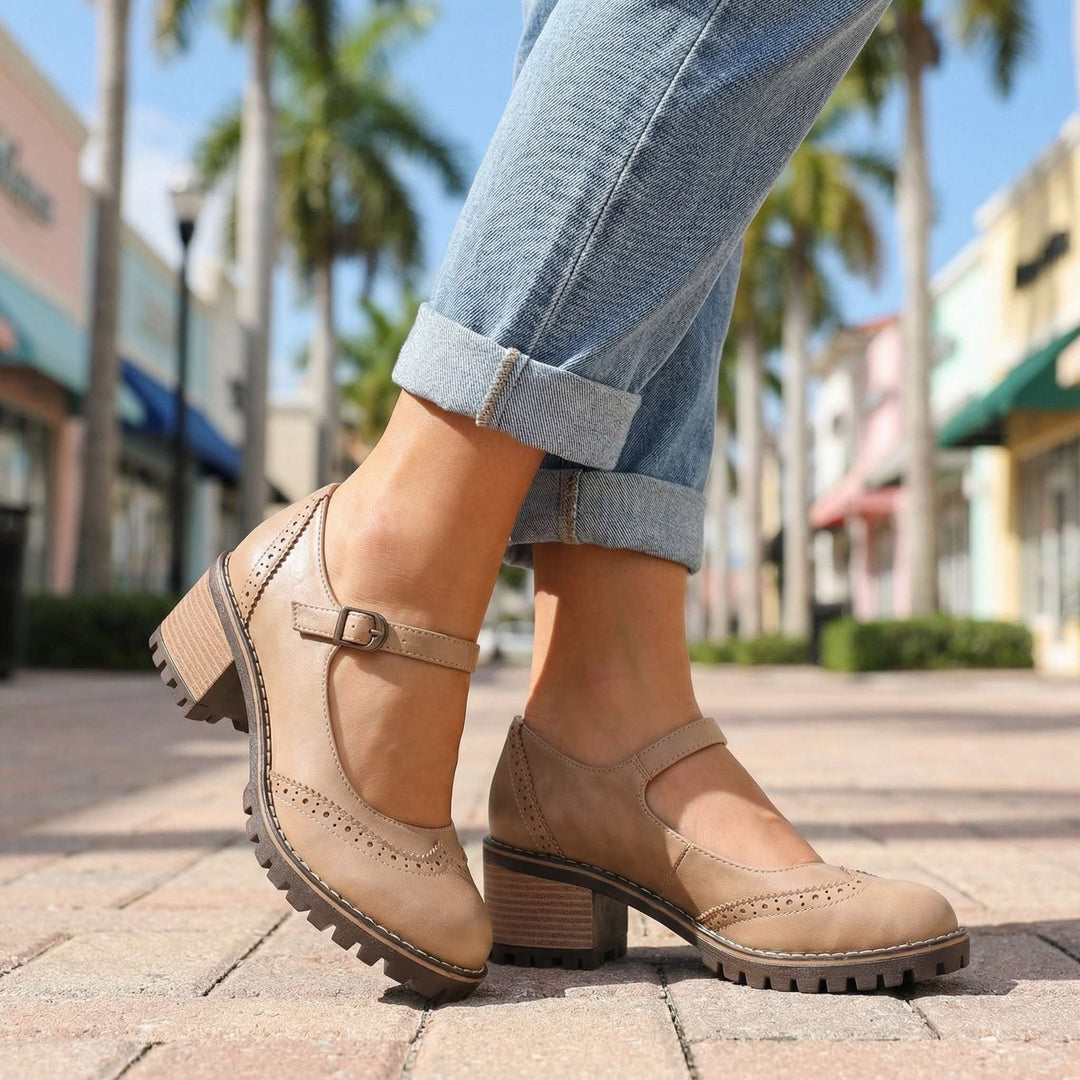 Close up of adjustable buckle strap on womens comfort block heel Mary Jane shoes