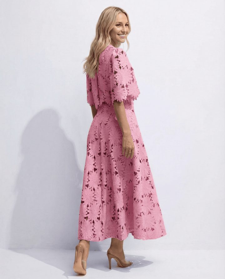 Back view of elegant two-piece midi dress with lace details