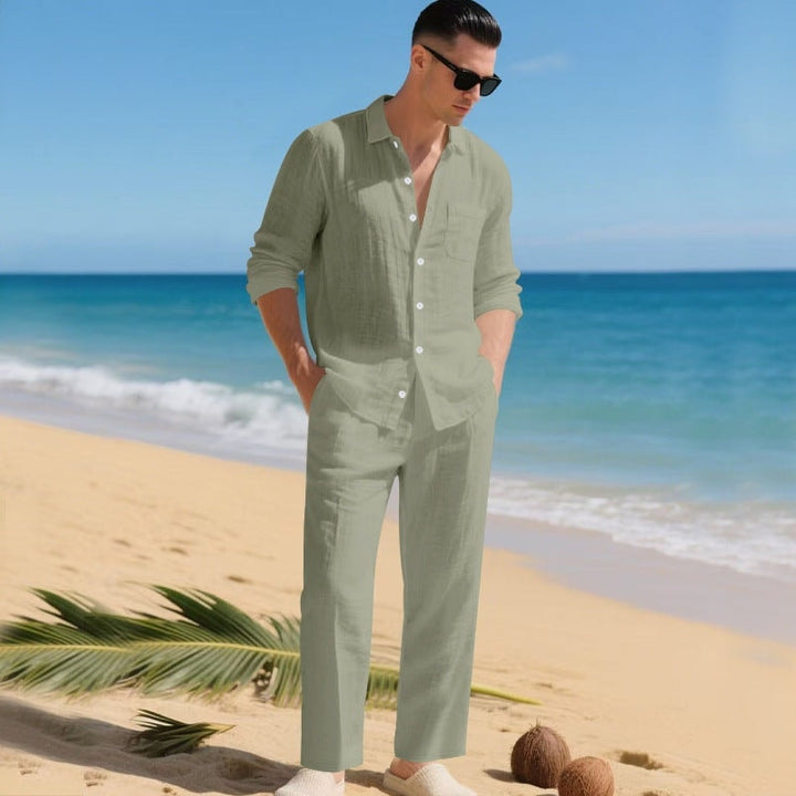 Flat lay of men's casual two-piece outfit including shirt and shorts for warm weather
