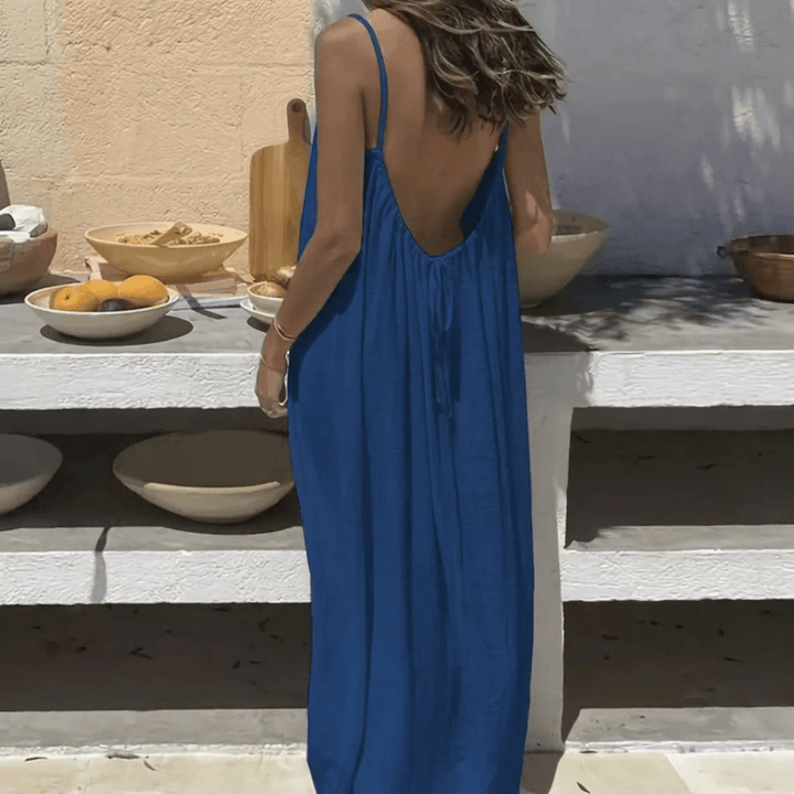 Elegant drape of a long backless dress designed for casual wear