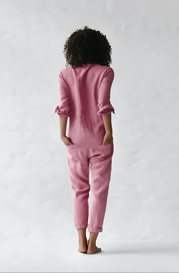 Full length view of a stylish womens utility jumpsuit styled for everyday wear