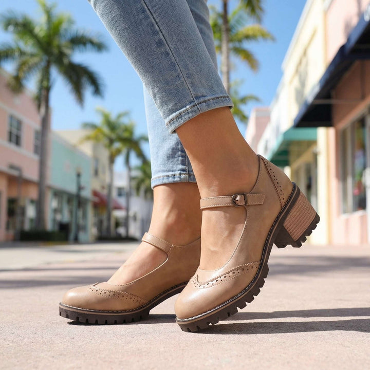 Pair of stylish retro block heel Mary Jane shoes for women displayed together
